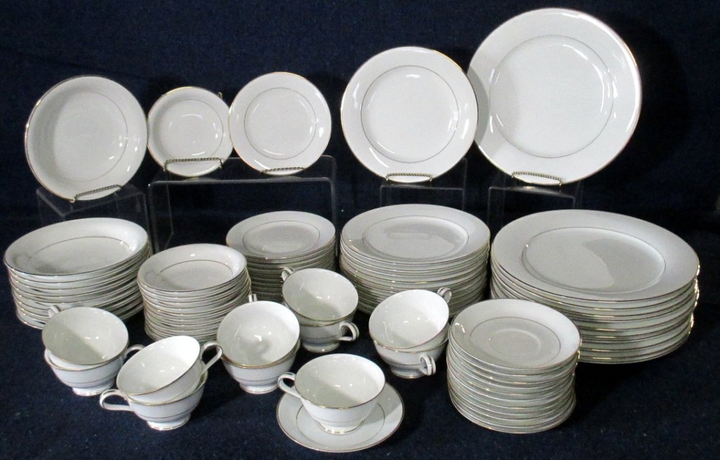 81 Pieces Noritake Dawn China: Gold trimmed 12 dinner plates, 12 salad plates, 12 bread plates,12 fruit bowls, 12 saucers, 11 cups, 10 soup/cereal bowls.