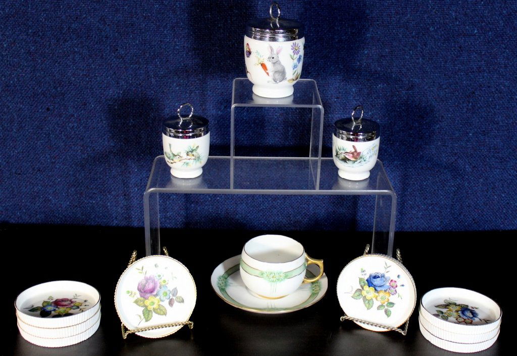 Royal Worcester English China Plus: 8 coasters, 3 egg cups and Austrian cup and saucer.