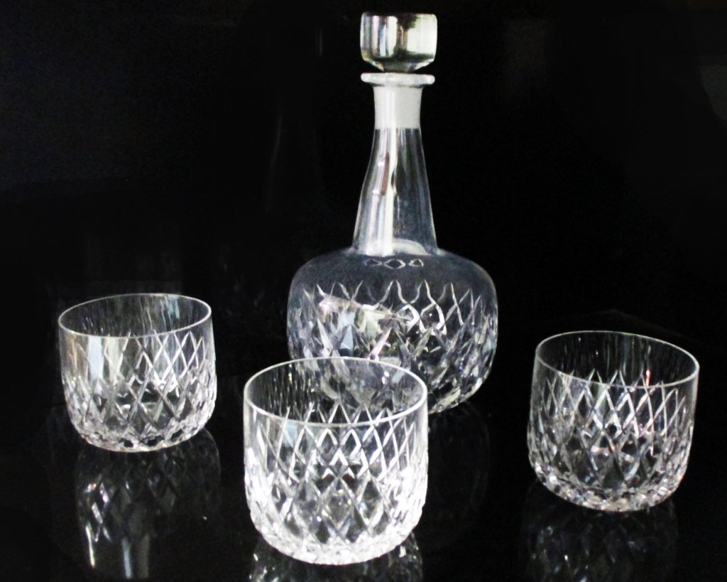 Orrefors Cut Crystal Decanter & Matching Glasses: Ground stopper, 3 old fashion glasses, 9.5" tall.
