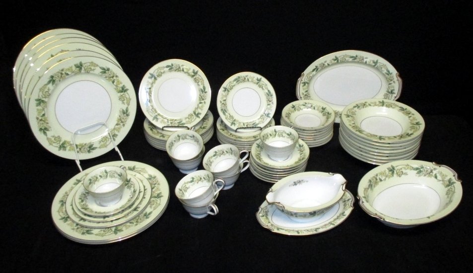 59 Pieces Noritake China: Service for 8 including dinner plate, salad plate, bread plate, cups & saucers, fruit bowls and soup bowls, 12" platter, gravy w/attached plate and oval vegetable.
