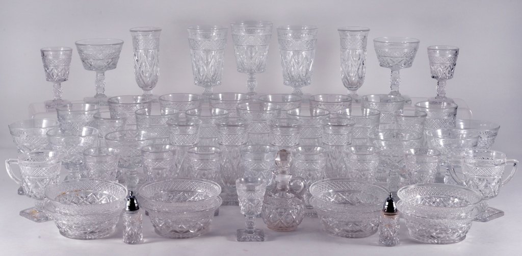 Cape Cod Glassware: Over 50 pieces including footed glassware, bowls, sherbets, cream & sugar, salt & pepper, cruet. Expected wear.
