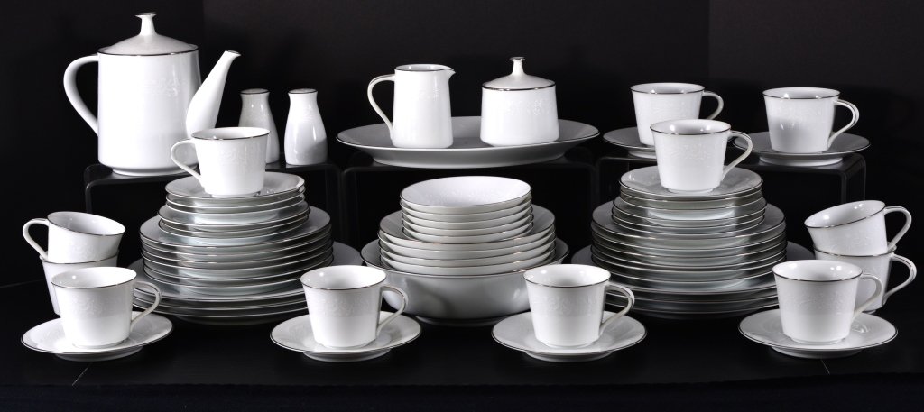 Noritake China Pattern Reina: 6 dinner plates, 12 salads, 12 cups and saucers, 6 bread and butters, 6 fruits, 6 soups, 12" L platter, 8.75" D round vegetable, cream and sugar, salt and pepper, teapot. Expected wear.