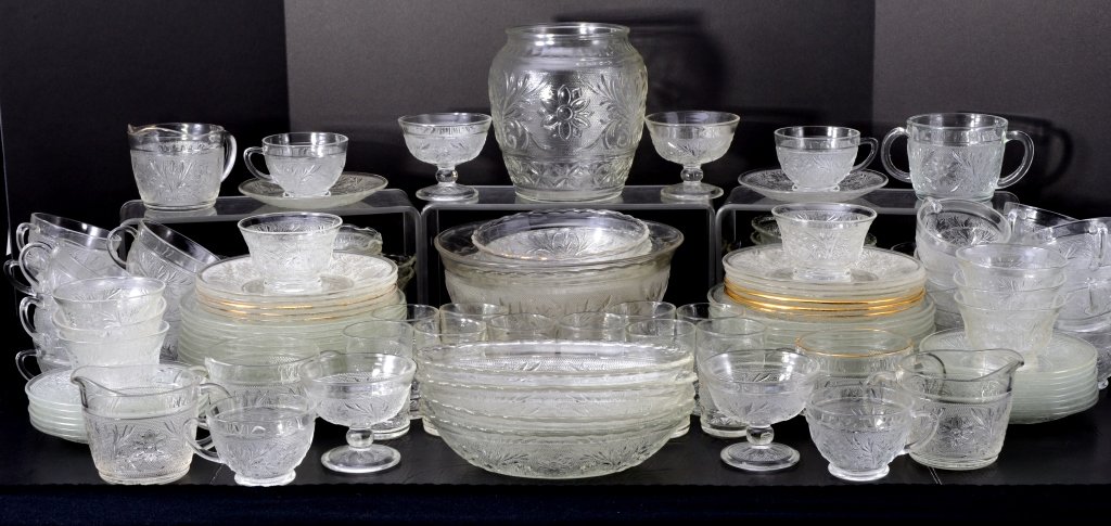 Clear Sandwich Dinnerware: Over 130 Pieces including creamers, sugars, cups & saucers, plates, cookie jar, bowls, ten 3.5" T glasses, sherbets, custards, platter 12" D and more. Expected wear.