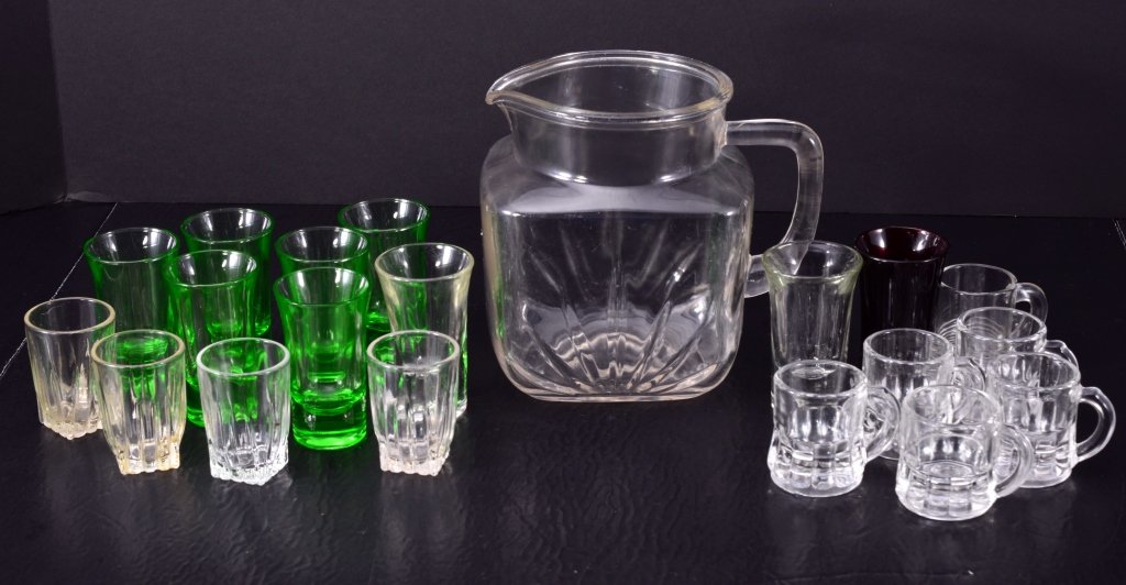 Pitcher w/19 Shot Glasses: Shot glasses red, green, clear. Expected wear.