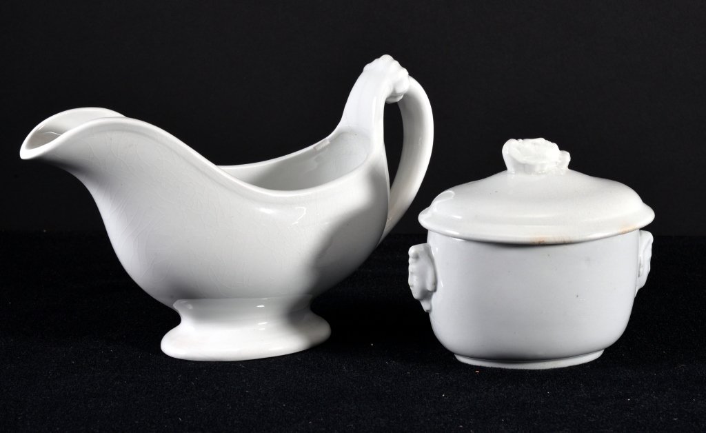 Ironstone Covered Butter/Condiment & Gravy/Sauce: English J & G Meakin covered butter/condiment w/face, tab handles & finial, approx 5" L x 4.5" T; gravy/sauce 9" spout to handle, damage at handle end.
