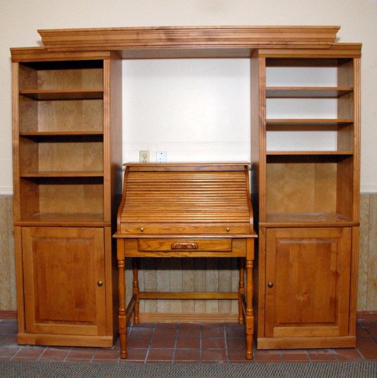 Oak Roll Top Desk in Storage Surround: Desk 30" x 24" x 44.5" T; surround 83" wide x 76" tall.
