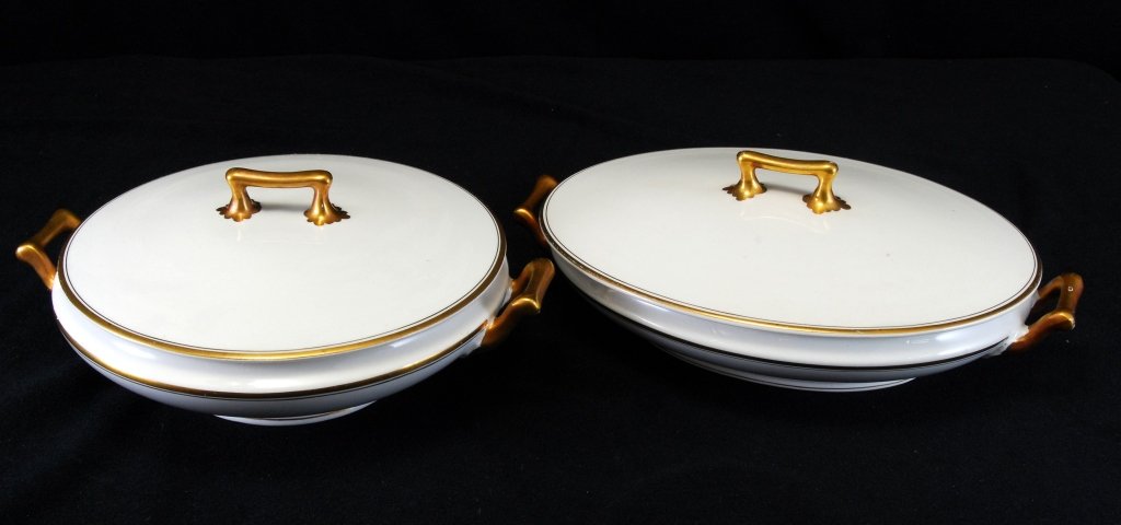 Two English Grindley Covered Casseroles: Oval (11.5" handle to handle), gold trim. Round bowl w/age crack.