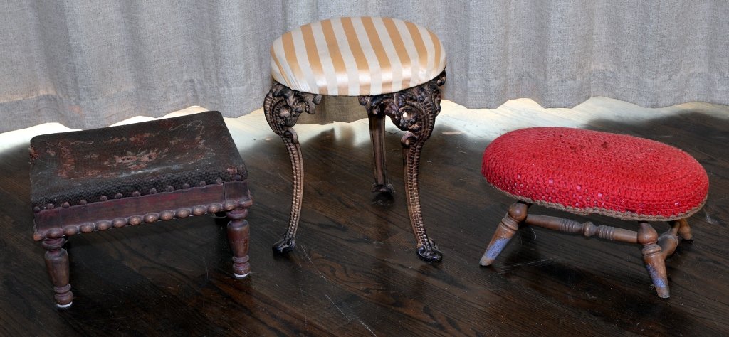 Three Footstools: Needlepoint worn, one dated 1948.