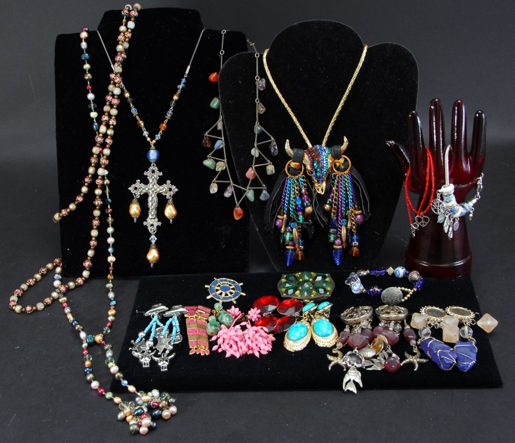 Multi-colored Estate Jewelry: Necklaces, bolo, earrings, bracelets, compact and pin.