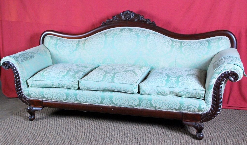 Empire Duncan Phyfe Style Sofa: Rolled and carved crest and arms, 41" center back height.