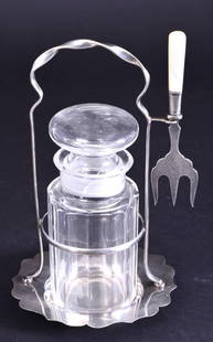 Silverplate Pickle Caster w/Pearl Handle Fork: Vintage silver rack w/3-tine fork, 9.5" tall. Crack base of ground stopper.