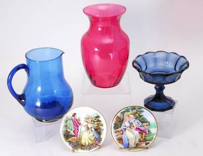 Colored Glass and Period Decorated Plates: Blue pedestal and pitcher, cranberry vase and pair 4.5" diameter plates.