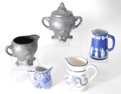 Ceramic Pitcher Lot Including Wedgwood: Blue & white 3.75" tall Wedgwood pitcher, 2 Japanese pitchers and Holland Mold silvered creamer & covered sugar.