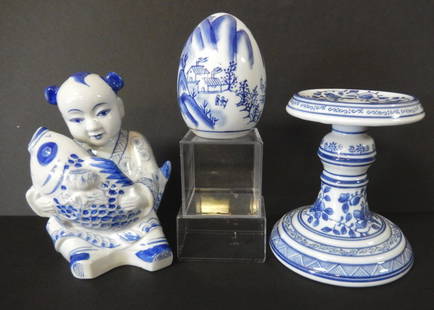 Oriental Blue & White Ceramics: Boy w/fish 7.5" tall, candlestick 7" tall and egg.