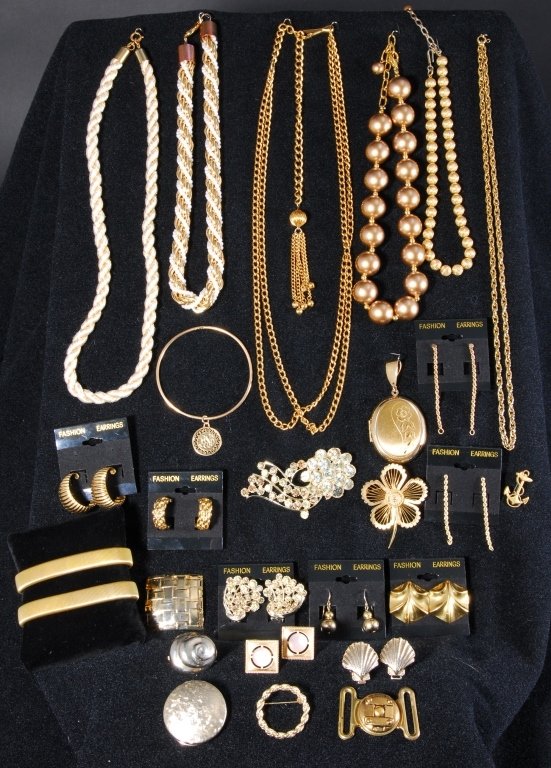 Gold, Pearl and Rhinestone Costume Jewelry: Necklaces, locket, one set cuff links, sleeve holders, earrings and pins. Estate jewelry.