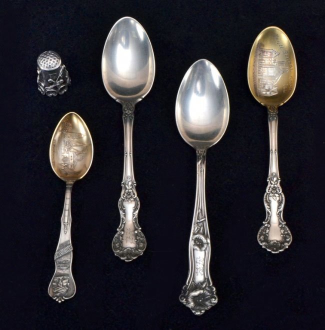 4 Sterling Spoons & Thimble: Including Gorham teaspoon and Gorham 5 o'clock spoon souvenir of Galva, Ill; heavily decorated Chicago souvenir demi-tasse spoon and a 1910 teaspoon together w/heavily decorated sterling thimble. 1 tr