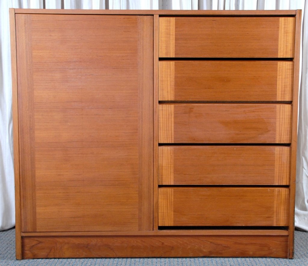 Teak Scandinavian Armoire: 5 drawers beside long door, stamped on back Made in Sweden, 49" W x 18.25" D x 43.5" T.