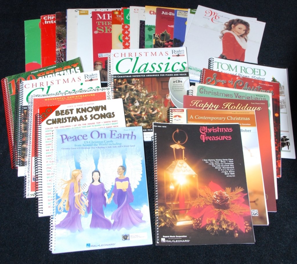 Large Selection Christmas Piano Books: The majority in spiral bound books together w/hard back Christmas Carol books.