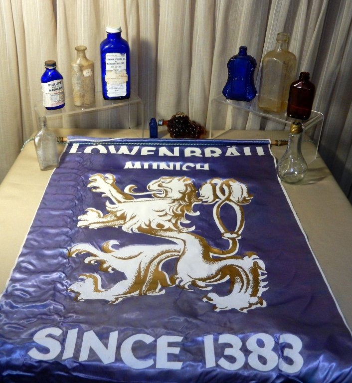 Munich Banner & Medicine Bottles Plus: Banner 38" T x 23.5" W.