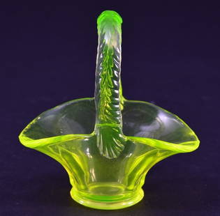 Miniature Yellow Vaseline Glass Basket: 4" tall.