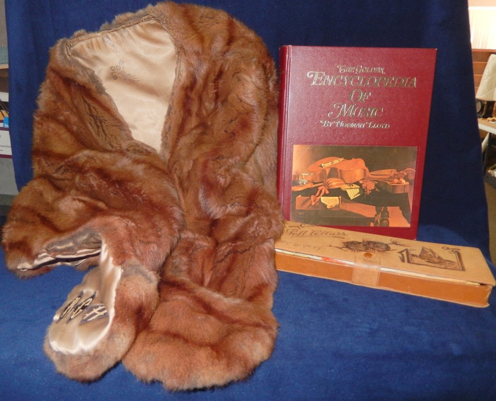 Fur Stole & 1924 Glove Box Plus: Stole with pockets, glove box with handkerchiefs, together with Norman Lloyd's Golden Encyclopedia of Music.