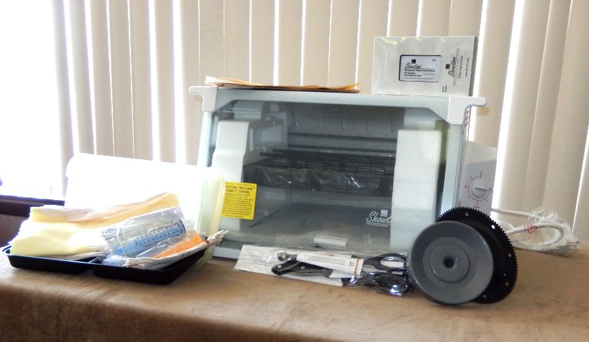 Showtime Pro Professional Chicken Rotisserie & BBQ: By Ronco, instructional video included. In box, does not appear to have been used.