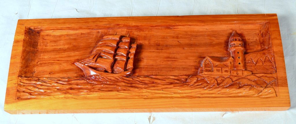 Hand Carved Solid Wood Art w/Ship and Lighthouse: 14" x 32" wide x 2" deep.