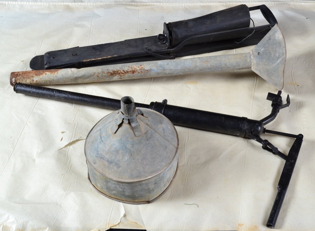 Metal Farm Tools: Seeder, barrel oil pump and 2 funnels.