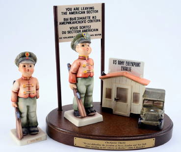 Hummel Checkpoint Charlie Collectibles: Checkpoint Charlie 3-piece Hummelscape w/Soldier Boy (332, TMK 7, 5 3/4" tall), Checkpoint Charlie Replica (TMK 6) & Plaque w/ wooden posts together with Soldier Boy ( 332, TMK 4, 5 3/4" tall).