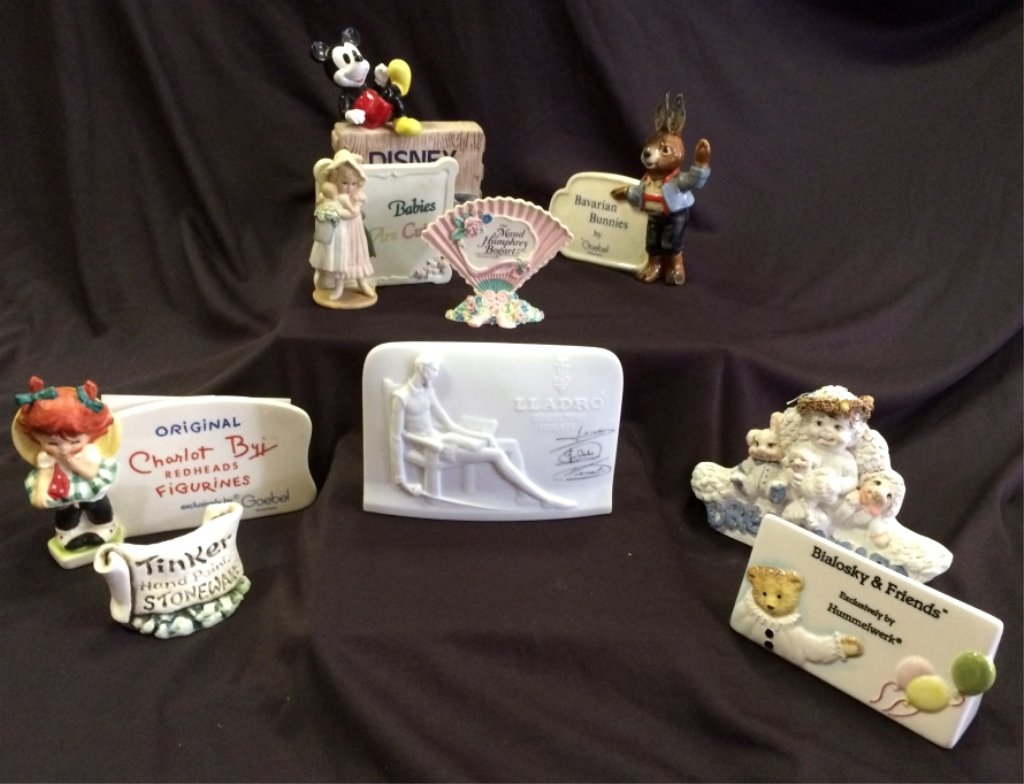 8 Dealer Display Signs Including Lladro: Lladro, Charlot Byi Redheads Goebel (TMK 6, 6.25" wide x 4.25" tall), Disney Schmid w/Mickey, Bialosky & Friends, Maud Humphrey Bogart, Dreamsicles, Babies Are Cute, Tinker Hand Painted Stoneware.