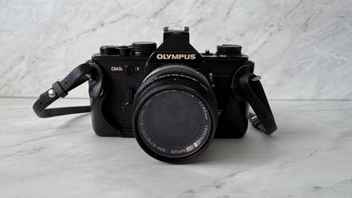 Olympus OM 2n MD Black Film Camera with Black Leather Case