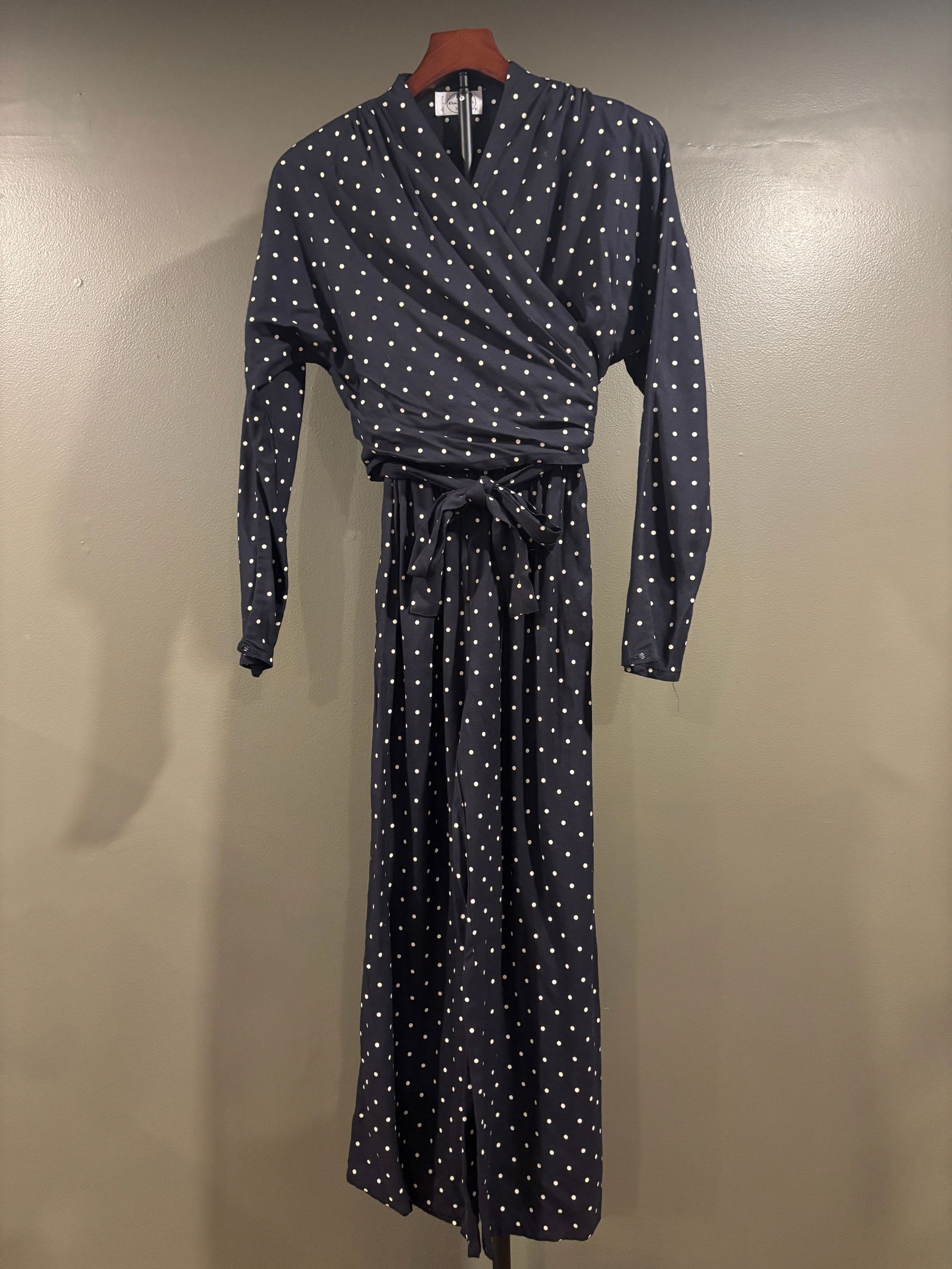 Vintage Polka Dot Wrap Top and Elastic Waist Pants Set, Made in USA, Size Small: Vintage two-piece women's ensemble featuring a navy blue ground with white polka dot pattern. The set includes a long-sleeve wrap-style blouse with soft drape and a coordinating pair of flowing pants