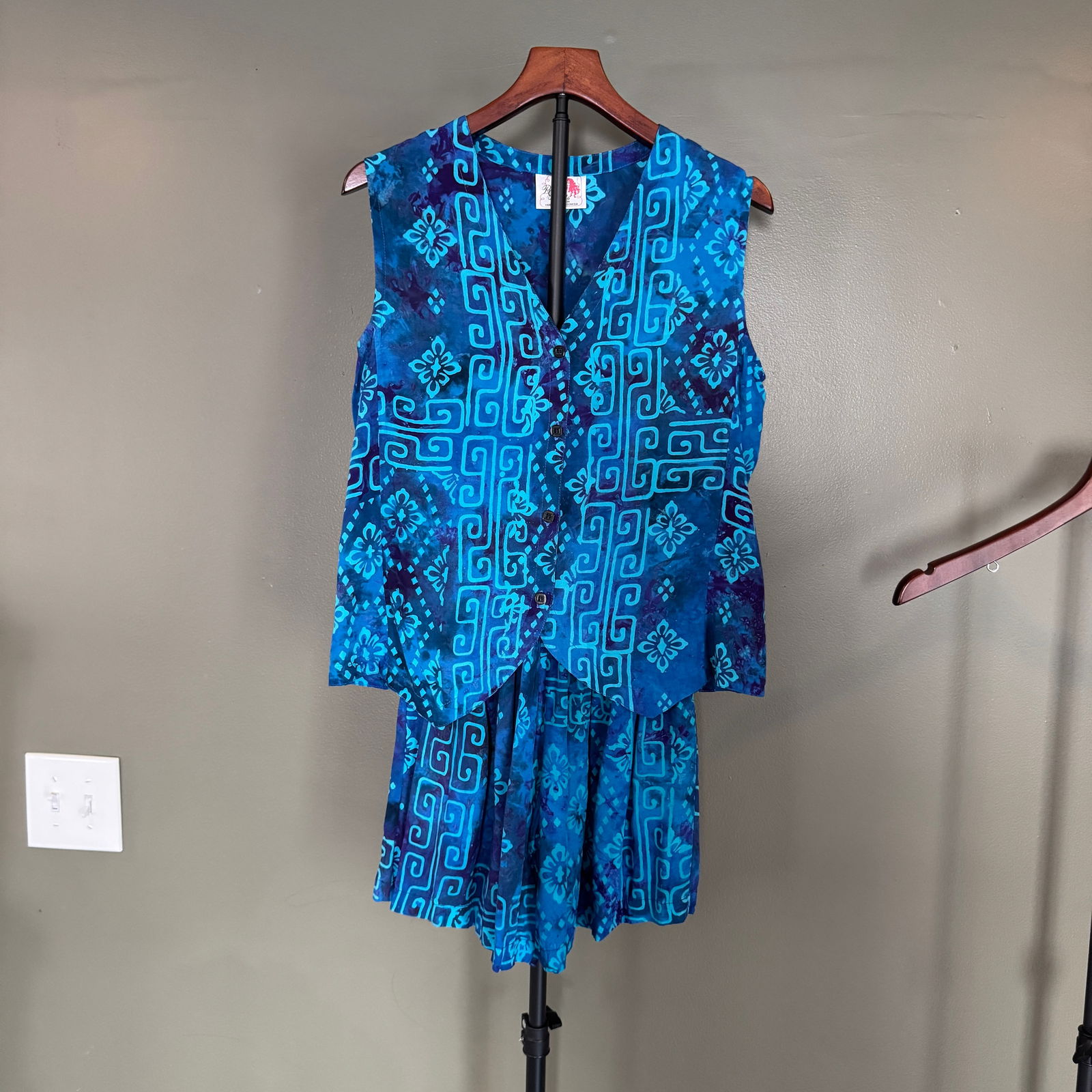 Red Threads Hand-Dyed Batik Three-Piece Set Vest, Skirt & Shorts, Indonesia: A striking three-piece batik ensemble by Red Threads, hand-made in Indonesia. This coordinated set includes a sleeveless vest, elastic-waist skirt, and matching shorts, all rendered in rich indigo and