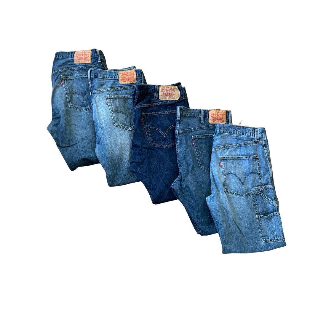 Group of Five Levi's Denim Jeans, Carpenter & Classic Styles, Assorted Sizes: A curated bundle of authentic Levi's jeans featuring a mix of classic blue washes and utility-forward styles. This lot includes traditional five-pocket denim alongside carpenter and loose-straight sil