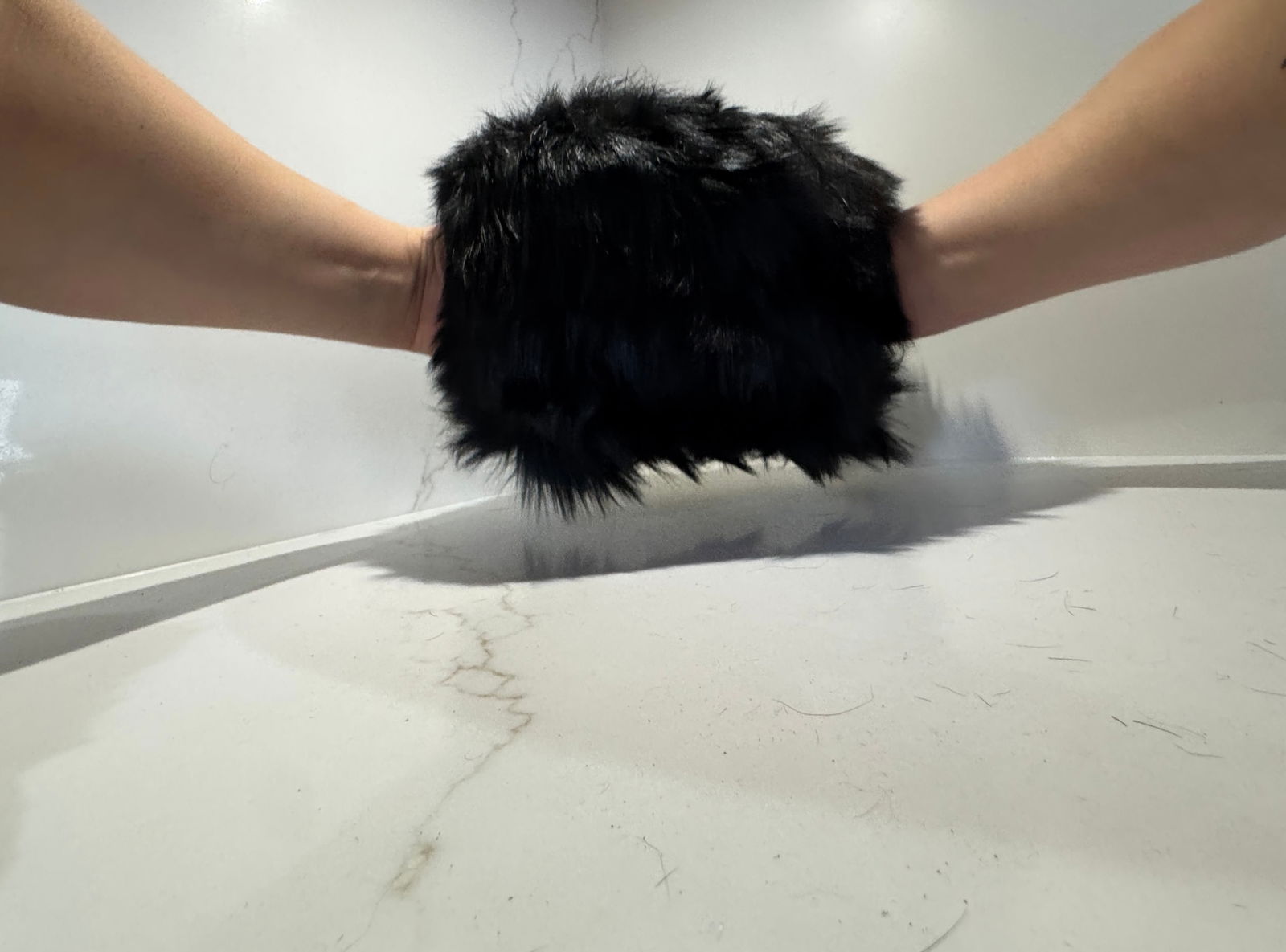 Vintage Black Fur Hand Muff: Classic vintage black fur hand muff, softly structured and generously sized, offering both warmth and timeless elegance. A refined winter accessory evocative of early to mid-20th-century style, suitab