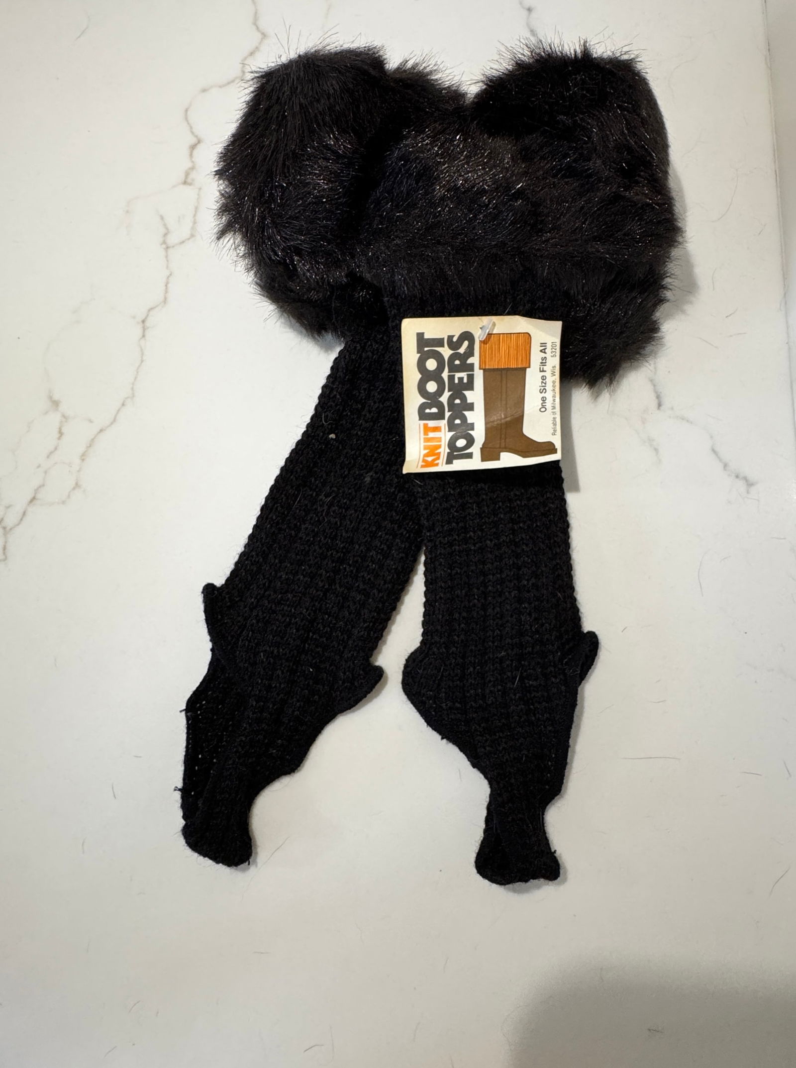 Vintage Knit Boot Toppers with Faux Fur Trim, USA Made: A vintage pair of knit boot toppers featuring plush black faux fur trim and a ribbed knit body designed to layer over boots for added warmth and style. Retaining the original Knit Boot Toppers tag, ma