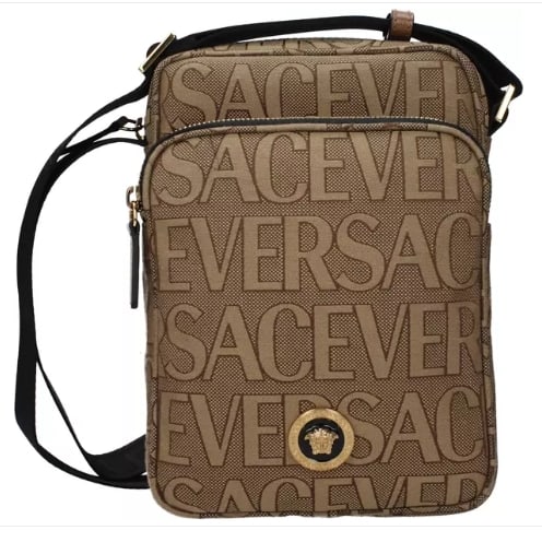 Versace – Beige Fabric Shoulder Bag: Beige fabric shoulder bag featuring an all-over Versace logo pattern and a compact vertical silhouette. Designed with a front zip compartment and a main zip closure, complemented by gold-tone metal ha