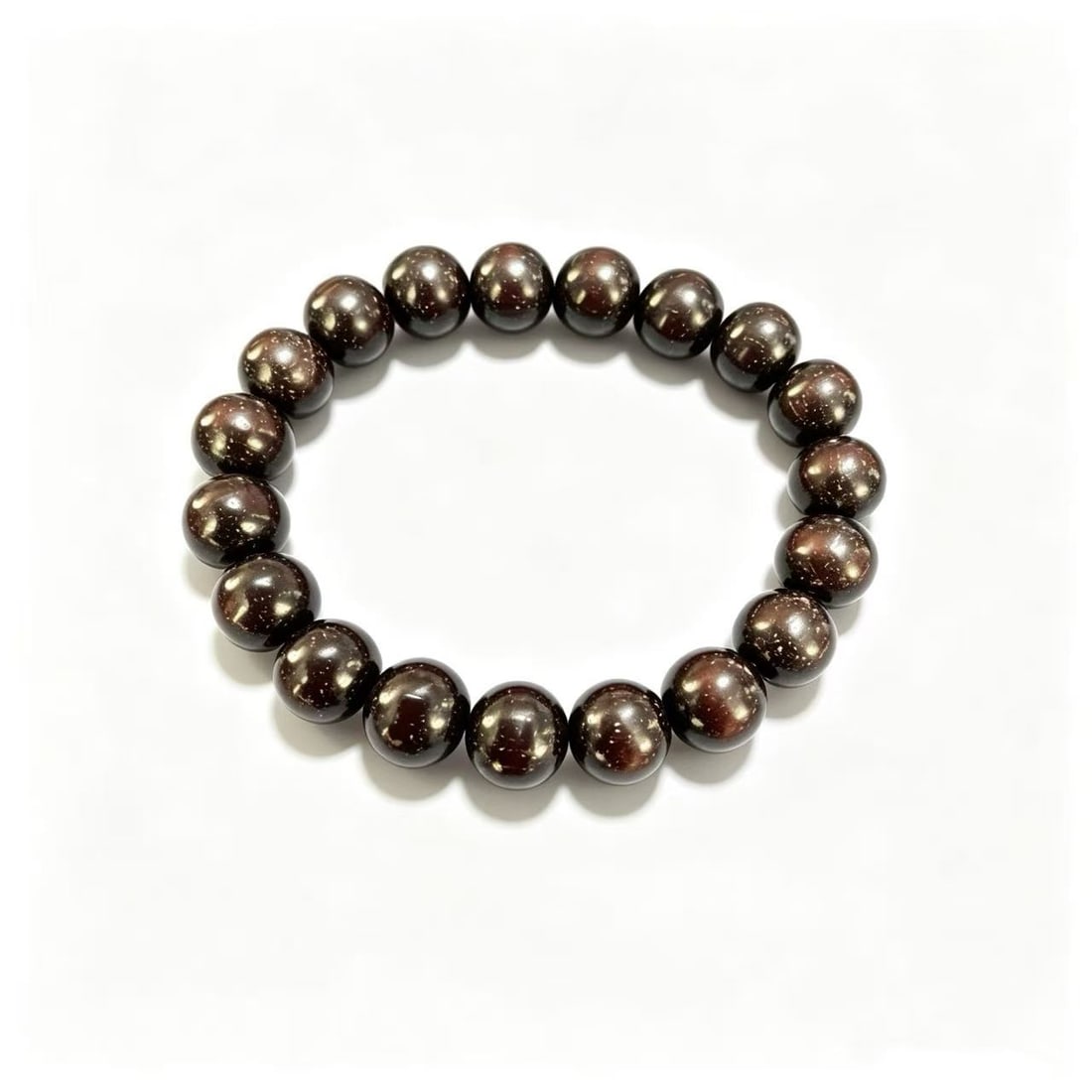 Gold Sand Obsidian Beaded Stretch Bracelet: Stretch bracelet featuring polished round gold sand obsidian beads with a dark reflective appearance and subtle shimmering inclusions. Presented in a minimalist beaded style suitable for everyday