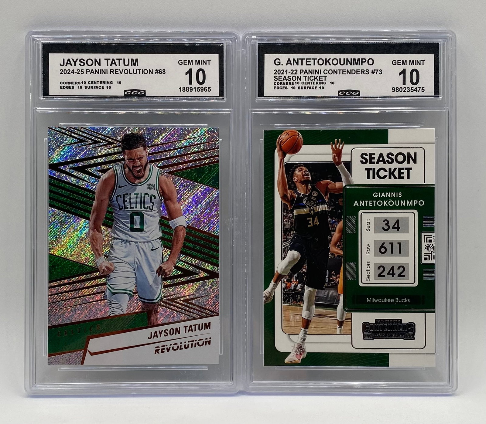 Jayson Tatum Rev And Giannis Antetokounmpo Giannis Cards: Dual NBA superstar lot featuring two pristine slabs graded CCG Gem Mint 10: 2024-25 Panini Revolution Jayson Tatum #68 (CCG 10 - Subgrades: 10/10/10/10) 2021-22 Panini Contenders Giannis Antetokounmpo