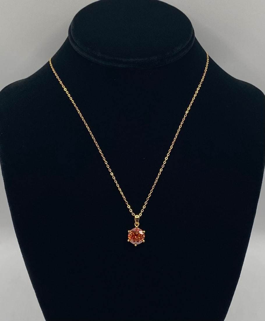 4 CT VVS1 Moissanite Solitaire Pendant Necklace - 18K Gold Plated 925 Silver (with COA): Fine jewelry pendant necklace featuring a 4.0-carat round-cut clear moissanite gemstone with VVS1 clarity. Set in a 6-prong 18K gold-plated 925 sterling silver basket setting on a matching chain Orang