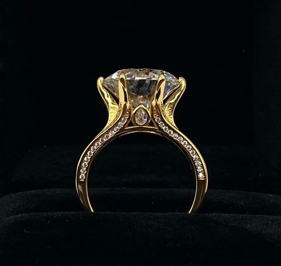 10 Ct D VVS1 Moissanite Cathedral Crown Ring with Accent Band | 18K Yellow Gold Plated 925 Silver: Crafted with architectural elegance, this ring features a brilliant round moissanite center stone set in a high cathedral crown with pavé accents along the cathedral arches and band. Plated in 18K ye