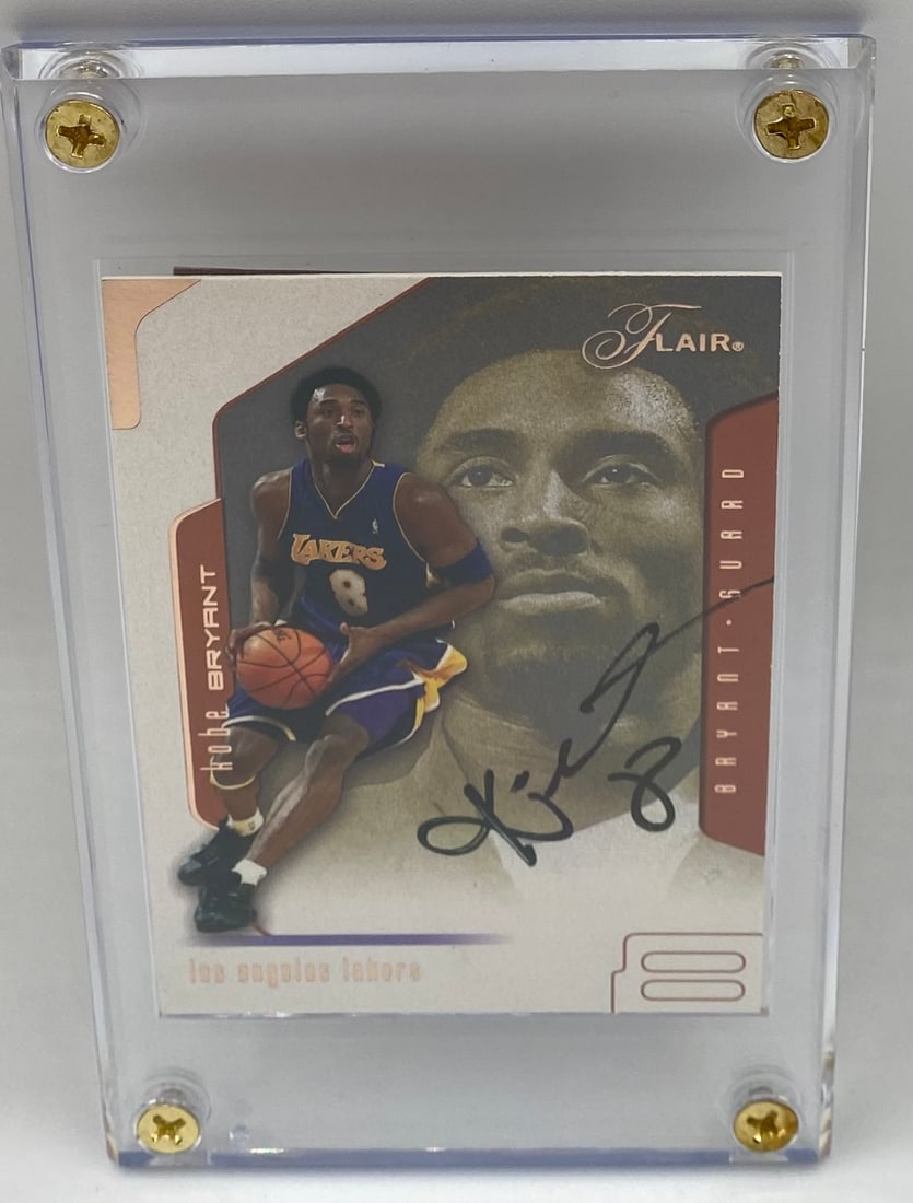 Kobe Bryant Autographed Card W/ COA: Player: Kobe Bryant Team: Los Angeles Lakers Set: 2001-02 Fleer/SkyBox Flair Features: Autographed (Front), COA Authenticity Overlay (Back) Display Case: Comes encased in a protective screw-down