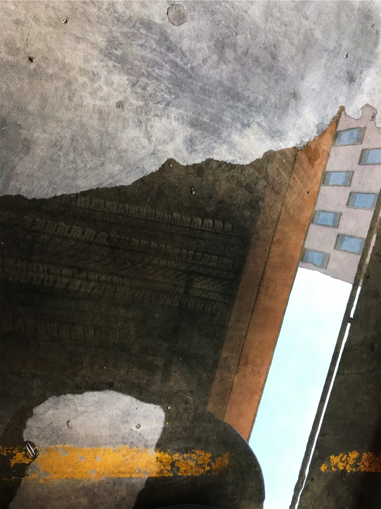 Sophie Carroll, Parking 1: Sophie Carroll is an emerging photographer who focuses on pattern and abstraction as a way of revealing how we imbue form with meaning. She studied semiotics and received a Fullbright Scholarship to