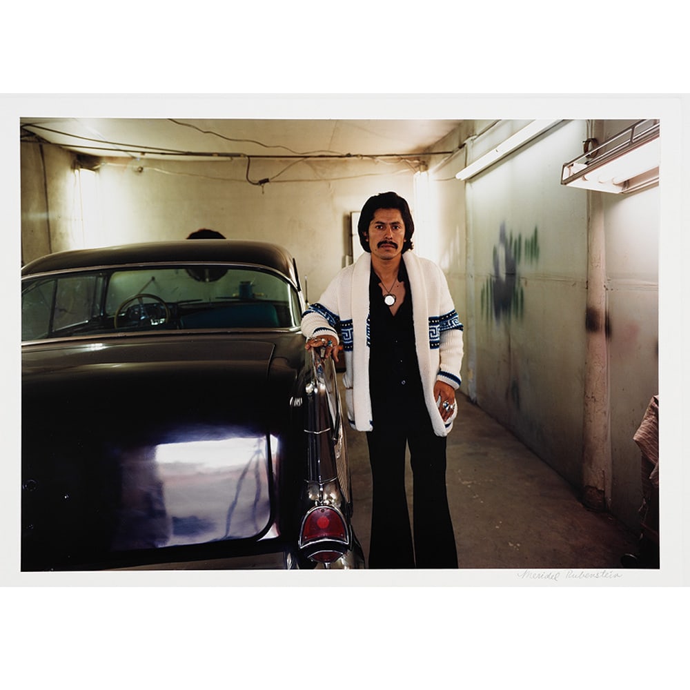 Meridel Rubenstein, Pete Solis, Albuquerque, '57 Chevy, from the "Lowriders: Portraits from New: American artist Meridel Rubenstein began her professional career in the early 1970s, evolving from photographer of single photographic images to an artist of extended works, multi-media