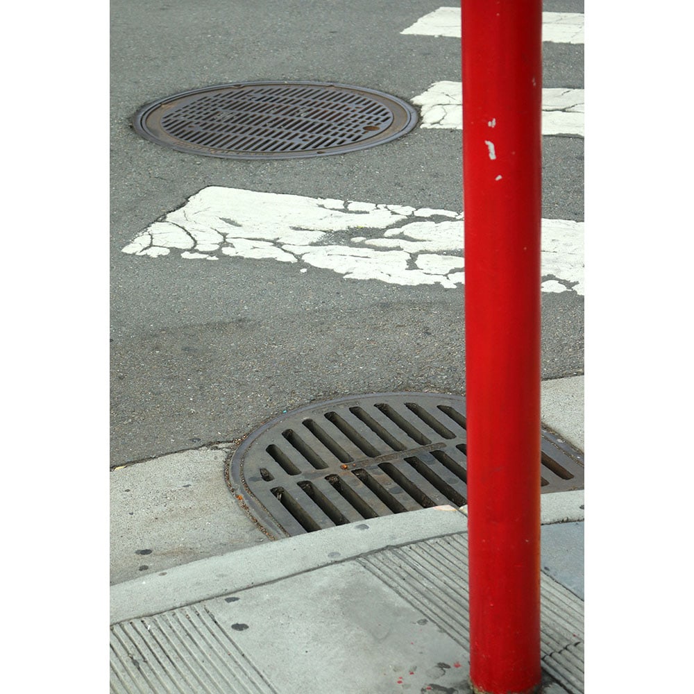Sophie Carroll, Pedestrian: Sophie Carroll's photography is a complex combination of geometry, color, pattern, and repetition. She explores abstraction and mystery as a way to explore how we imbue form with meaning. This photo w