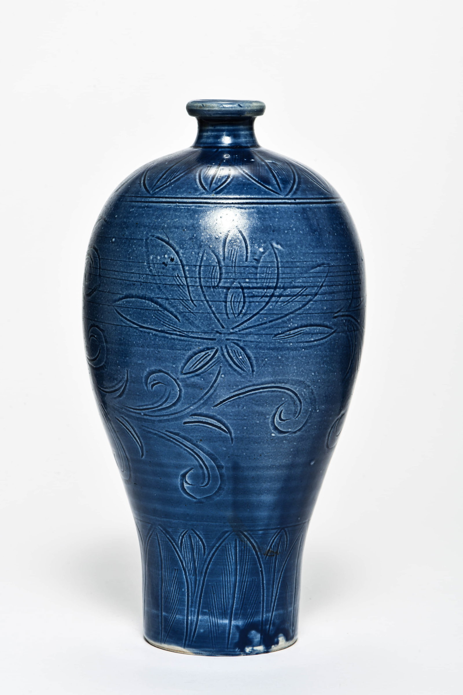 A BLUE-GLAZED INCISED 'FLORAL' MEIPING: A BLUE-GLAZED INCISED 'FLORAL' MEIPING Description: Length: 13cm Width: 13cm Height: 27cm
