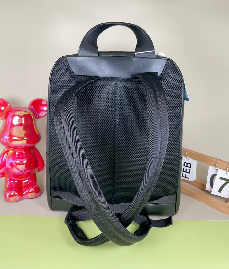 LOUIS VUITTON BLACK EMBOSSED MONOGRAM BACKPACK - 2