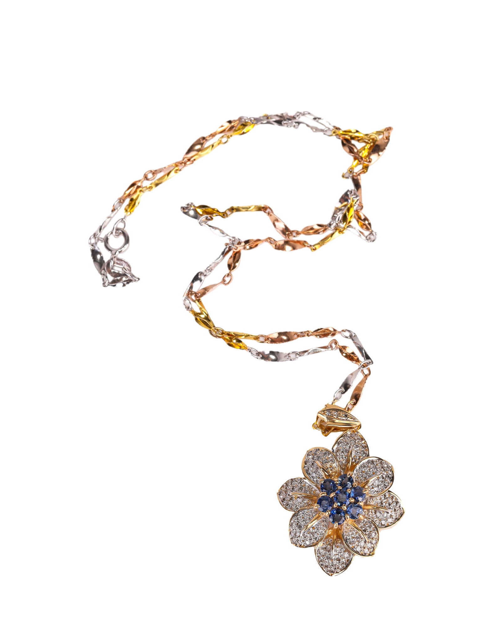 A GOLD AND GEM-SET NECKLACE: A GOLD AND GEM-SET NECKLACE Dimensions: Weight: 11 g. Length: 2.3 cm (0.9 in.), Width: 2.7 cm (1.1 in.), Height: 1.2 cm (0.5 in.). All measurements are approximate.