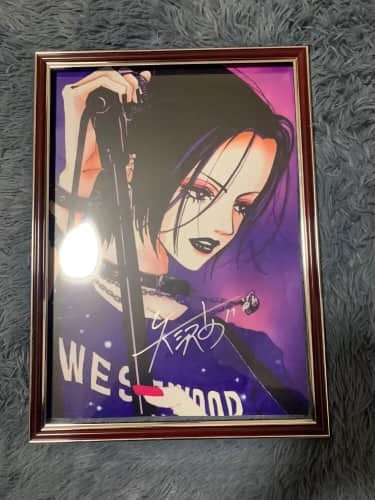 AI YAZAWA SIGNED PHOTOGRAPH: AI YAZAWA SIGNED PHOTOGRAPH Dimensions: Dimensions: 30 × 42 cm (11.8 × 16.5 in.). All measurements are approximate. Signature: Ai Yazawa Description: AI YAZAWA SIGNED PHOTOGRAPH. A photograph