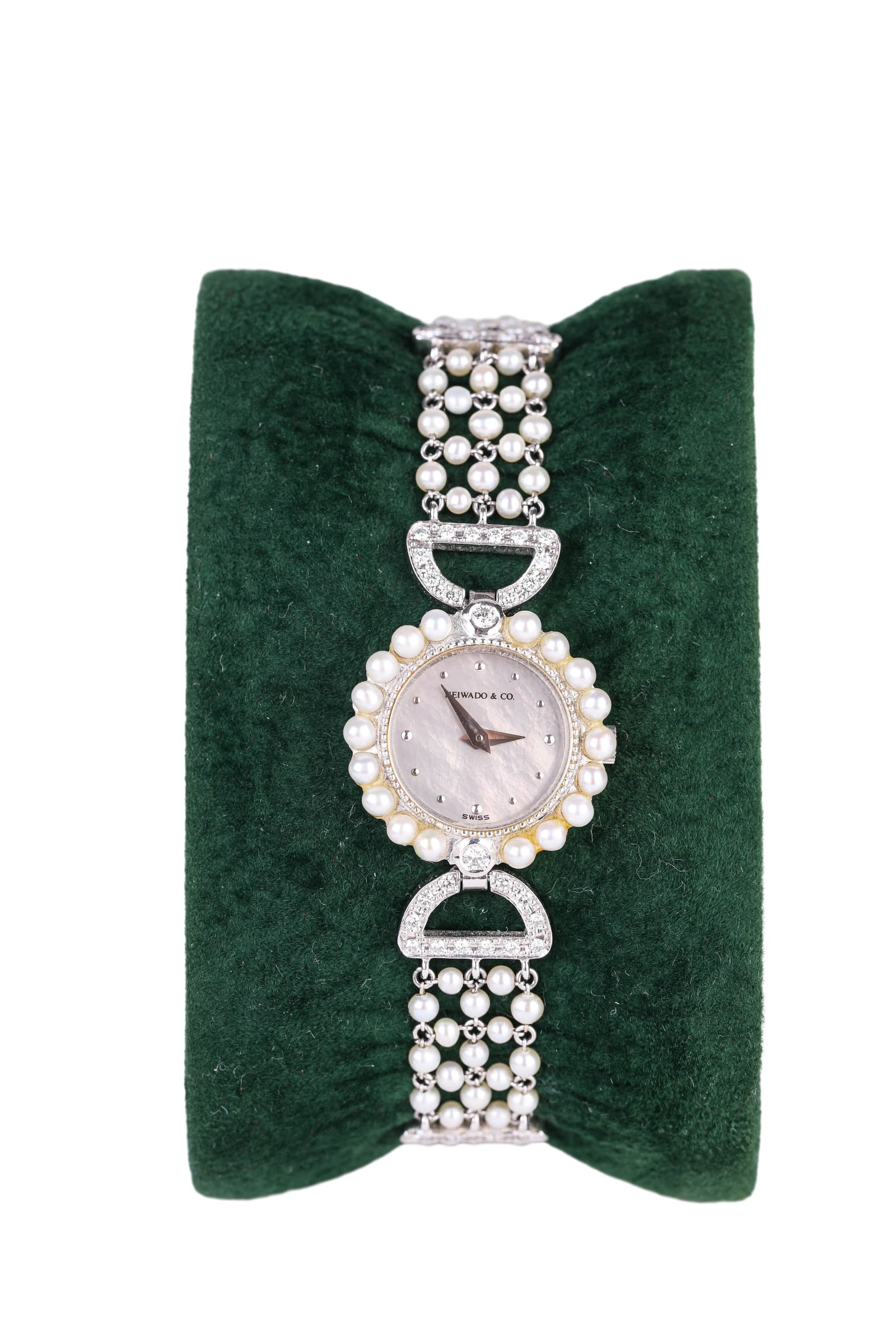 HEIWADO PEARL AND DIAMOND-SET BRACELET WATCH: HEIWADO PEARL AND DIAMOND-SET BRACELET WATCH Dimensions: Width: 2.1 cm (0.8 in.). All measurements are approximate.